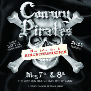 An image of a white skull and crossbones, on a black background. The text reads: Conwy Pirates Festival, May 7th and 8th 2023. "The most fun you can have on dry land!". A Conwy Chamber of Trade event.